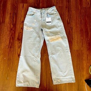 New with all tags straight leg, ripped jeans. Bought at DollsKill online store